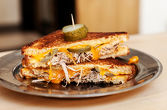 PULLED PORK grilled cheese ----- pulled pork with vinegar based sauce, chipotle mayo, 
pickled red onions, jalapeño, melted english cheddar, butter, brioche bread